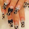 beige black animal print bows french nails