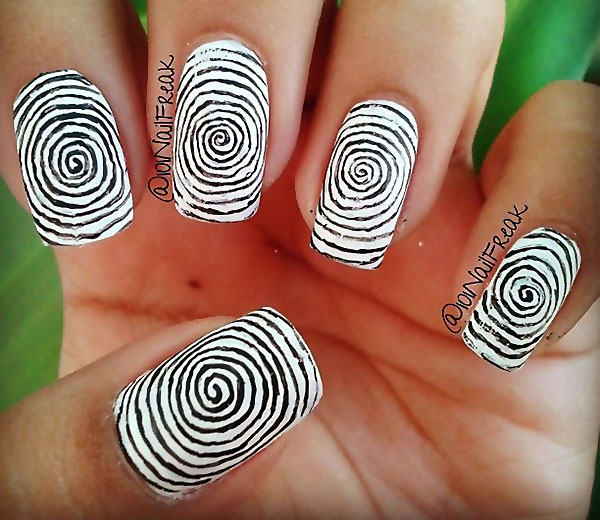 hypnotic black and white swirl nails