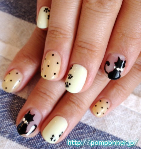 black cat beige dotted nails