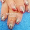 black gold feathers red french nails