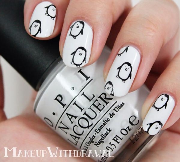 black penguins on white nails