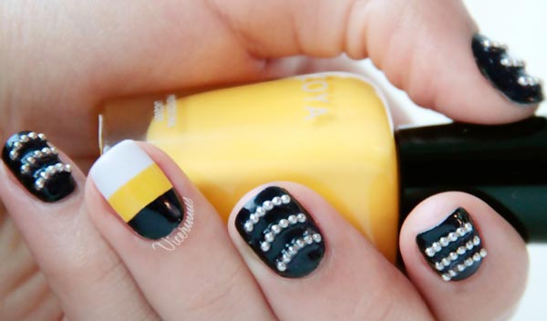 black white yellow studded waves nails