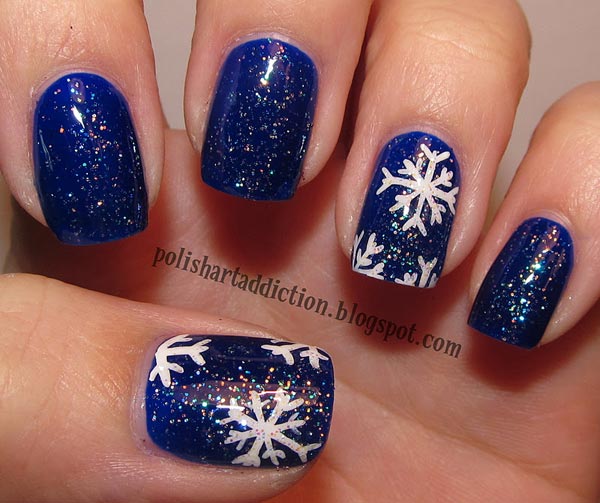 blue nails white snowflakes