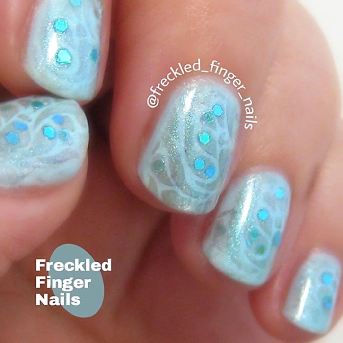 blue stamped glitter winter nails
