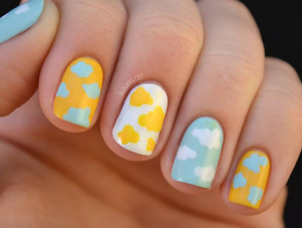 blue yellow white pastel clouds nails