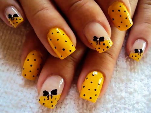 bows black dots yellow nails