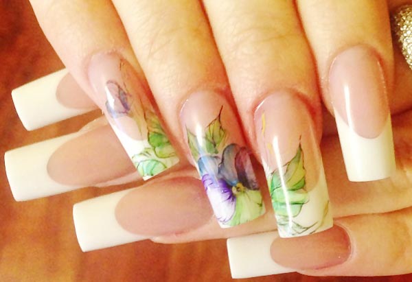 flower accent on classic french nails