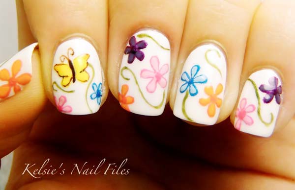 flowers butterfly on white spring nails