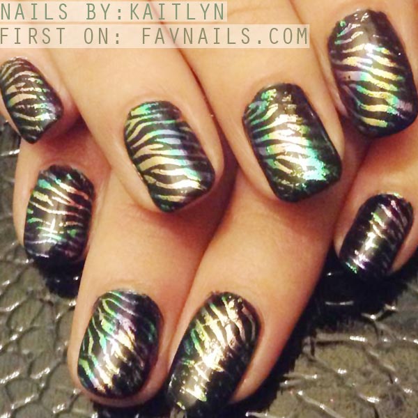 foil stamped zebras on black nails