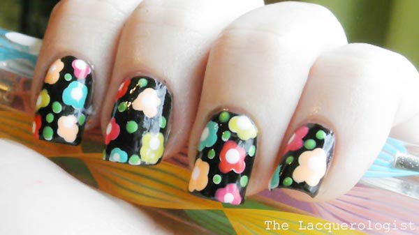 freehand flowers on black spring nails