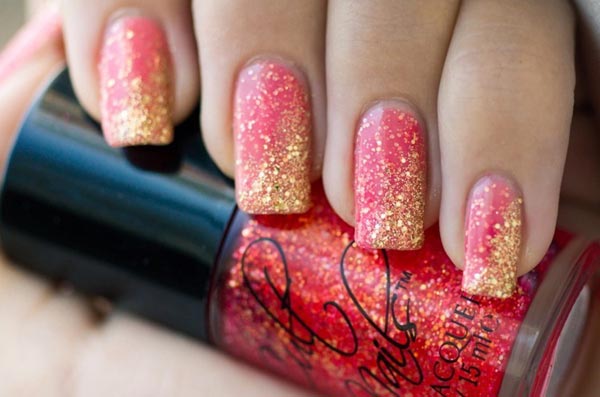 gold glitter on pink nails