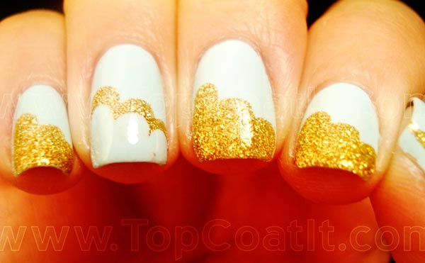 golden shimmer clouds light blue nails