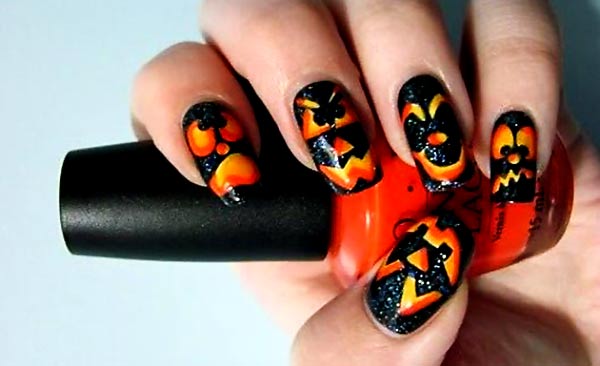 orange yellow faces black halloween nails