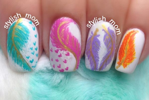pastel feathers on white nails