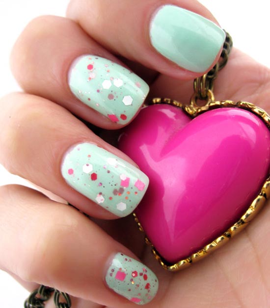 pink glitter on pastel blue nails