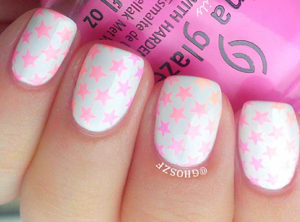 pink neon stamped stars on white nails