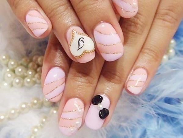 pink peachy glitter bow girly nails