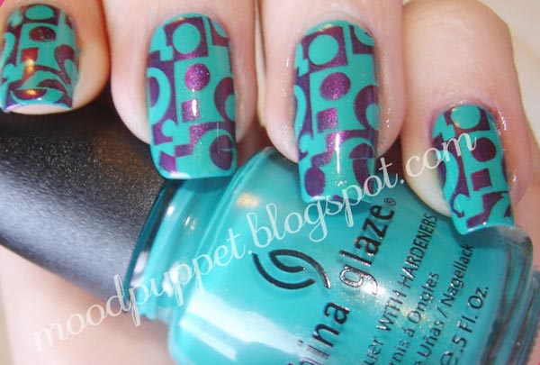 purple stamped emerald nails