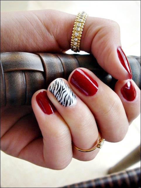 red and zebra nails