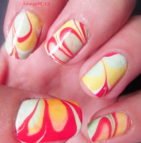 red blue yellow pastel marbled nails