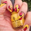 red yellow black ikat nails