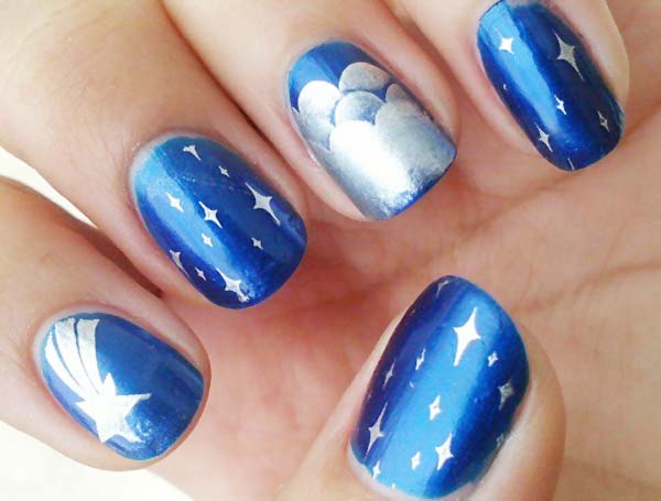 silver stamped blue starry night nails