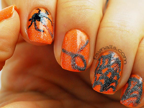 spider web glitter freehand orange halloween nails