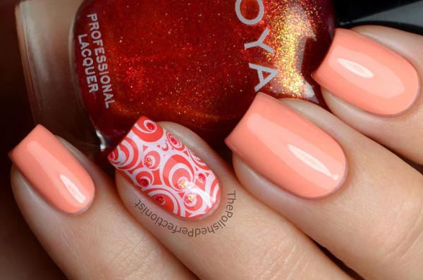 stamped accent nail on coral nails