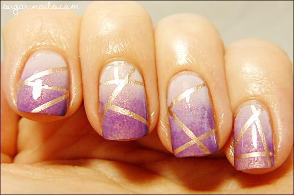 striped purple gradient over gold nails