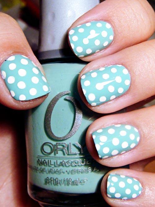 white polka dots nails